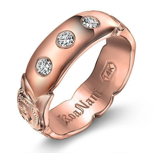 The picture shows a 14K rose gold 6mm ring with hand engravings and diamonds.