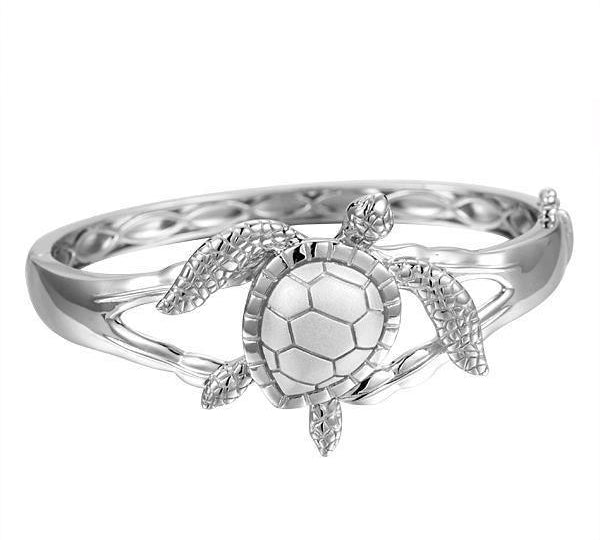 The picture shows a 925 sterling silver sea turtle bangle.