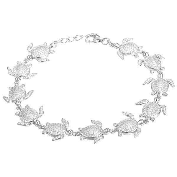 The picture shows a 925 sterling silver white gold-plated sea turtle bracelet with cubic zirconia.