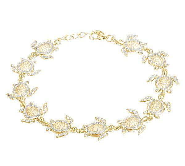 The picture shows a 925 sterling silver yellow gold-plated sea turtle bracelet with cubic zirconia.