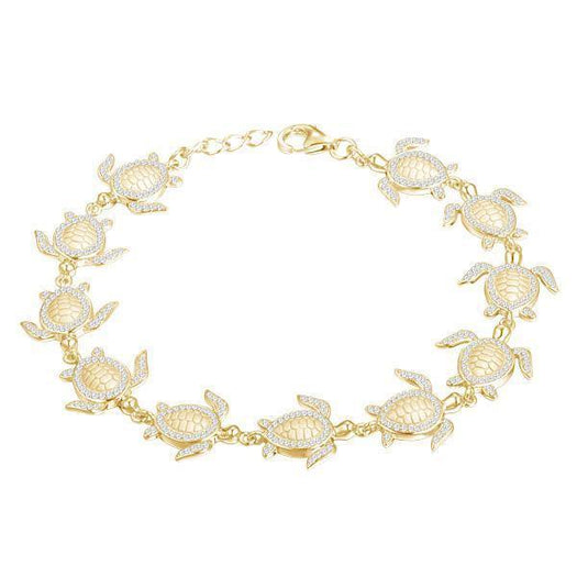 The picture shows a 925 sterling silver yellow gold-plated sea turtle bracelet with cubic zirconia.