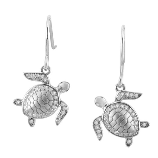 The picture shows a pair of 14K white gold sea turtle hook earrings with diamonds.