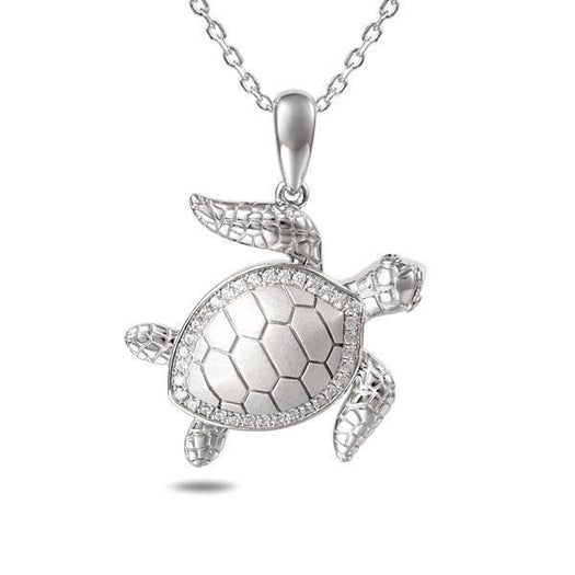 The picture shows a 925 sterling silver sea turtle pendant with topaz.