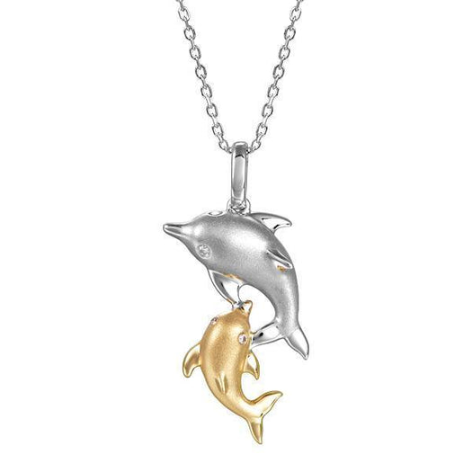 The picture shows a 14K white and yellow gold two dolphin pendant.