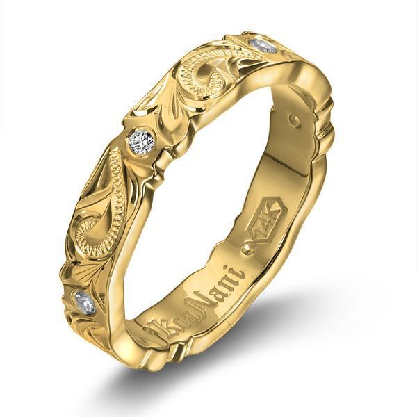 The picture shows a 14K yellow gold wave infinity ring with diamonds and hand engravings.
