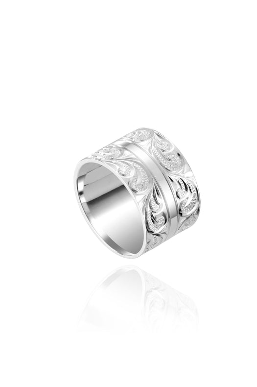The picture shows a 925 sterling silver 12 mm ring with hand engravings of scrolls.
