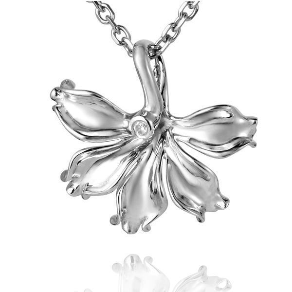 In this photo there is a sterling silver naupaka flower pendant with cubic zirconia.