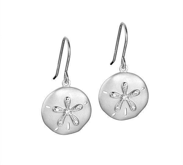 The picture shows a pair of white gold sand dollar hook earrings with topaz.