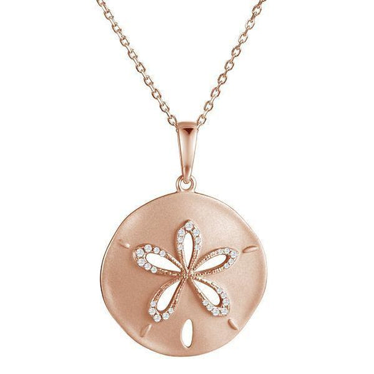 The picture shows a 14K rose gold sand dollar cut out pendant with diamonds.