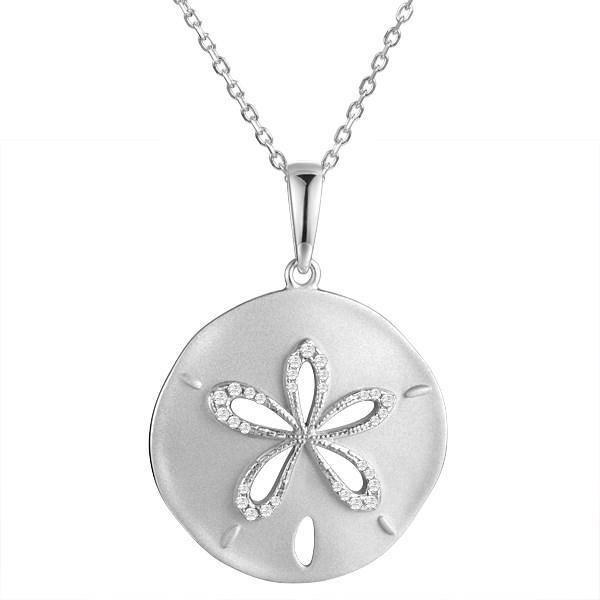 The picture shows a 14K white gold sand dollar cut out pendant with diamonds.