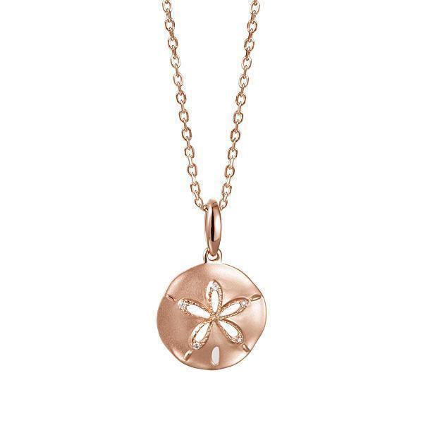 The picture shows a small 14K rose gold sand dollar cut out pendant with diamonds.