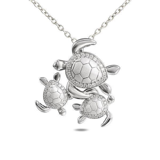 The picture shows a 925 sterling silver three sea turtle pendant with topaz.
