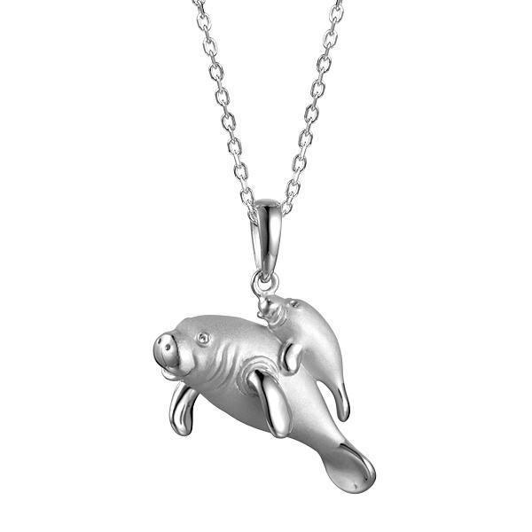 The picture shows a 925 sterling silver family of manatees pendant.