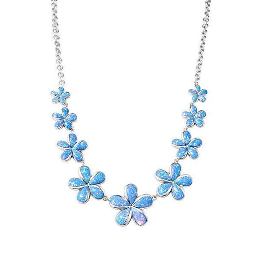 In this photo there is a sterling silver necklace with nine plumeria flowers and blue opalite gemstones.