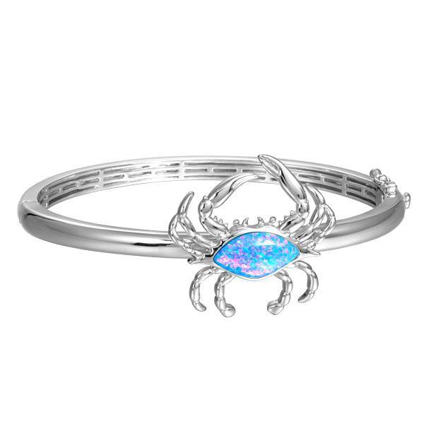The picture shows a 925 sterling silver blue crab bangle with opalite.