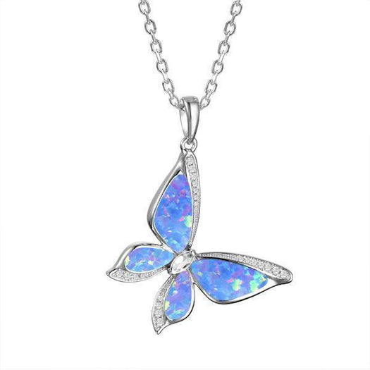 In this photo there is a sterling silver butterfly pendant with blue opalite gemstones and topaz.