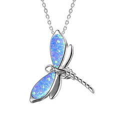 In this photo there is a sterling silver dragonfly pendant with blue opalite.