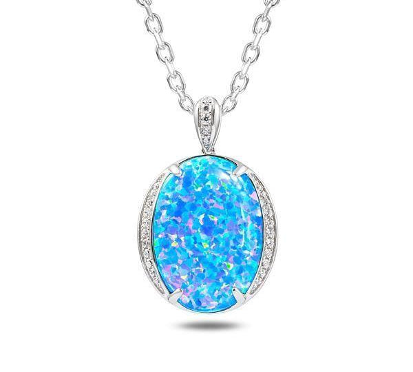 The picture shows a 925 sterling silver opalite eclipse pendant with cubic zirconia.