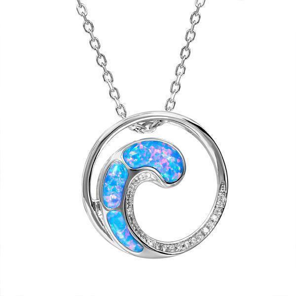 In this photo there is a sterling silver circle and wave pendant with blue opalite and topaz gemstones.