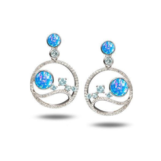 In this photo there is a pair of sterling silver circle earrings with blue opalite, aquamarine, and cubic zirconia.