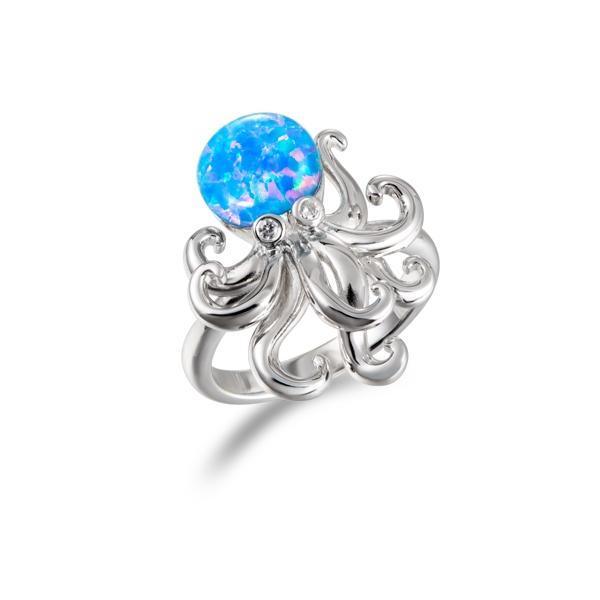 The picture shows a 925 sterling silver opalite octopus ring with topaz eyes