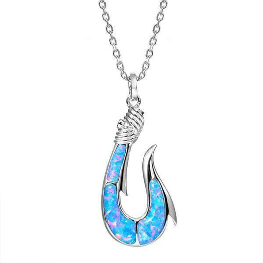 In this photo there is a sterling silver fish hook pendant with blue opalite gemstones.