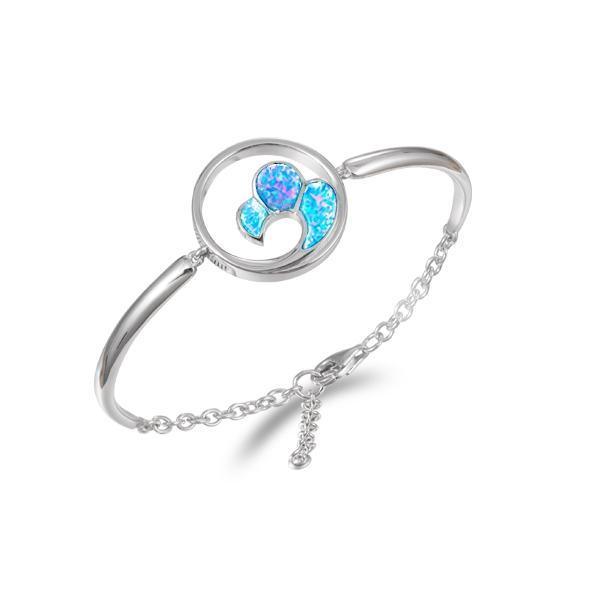 In this photo there is a 925 sterling silver big wave bracelet with blue opalite gemstones.