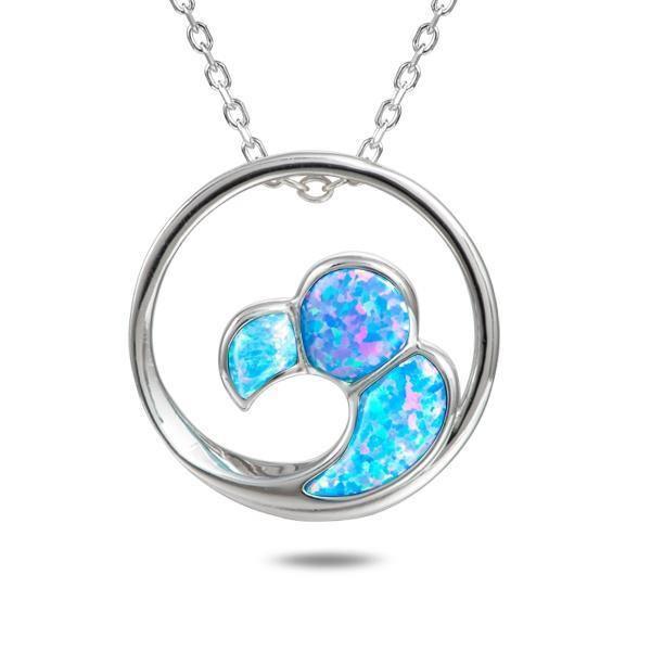 In this photo there is a sterling silver big wave circle pendant with blue opalite gemstones. 