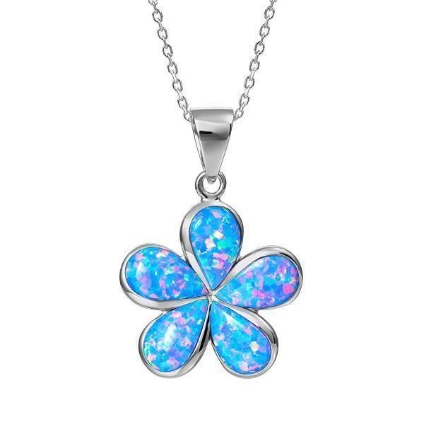 In this photo there is a large sterling silver plumeria pendant with blue opalite gemstones.