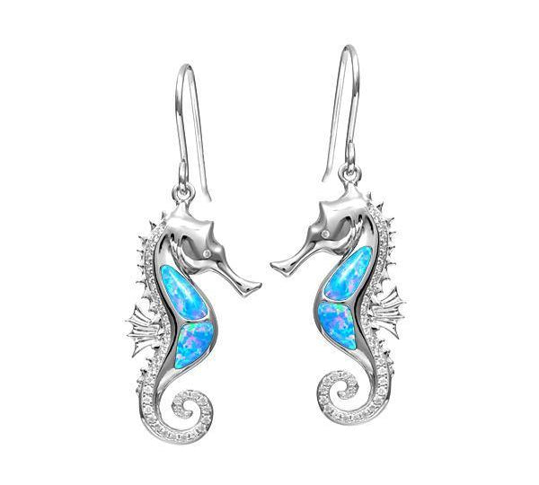 The picture shows a pair of 925 sterling silver opalite seahorse earrings with cubic zirconia.