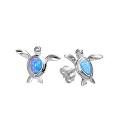 The picture shows a pair of 925 sterling silver opalite sea turtle stud earrings.