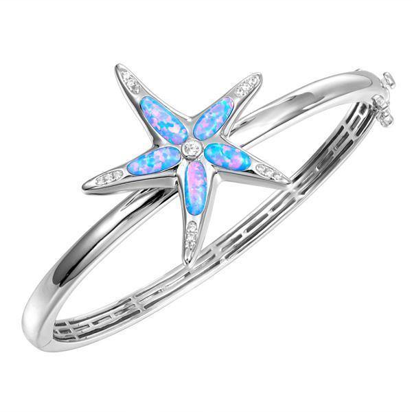 The picture shows a 925 sterling silver opalite sea star bangle bangle with topaz.