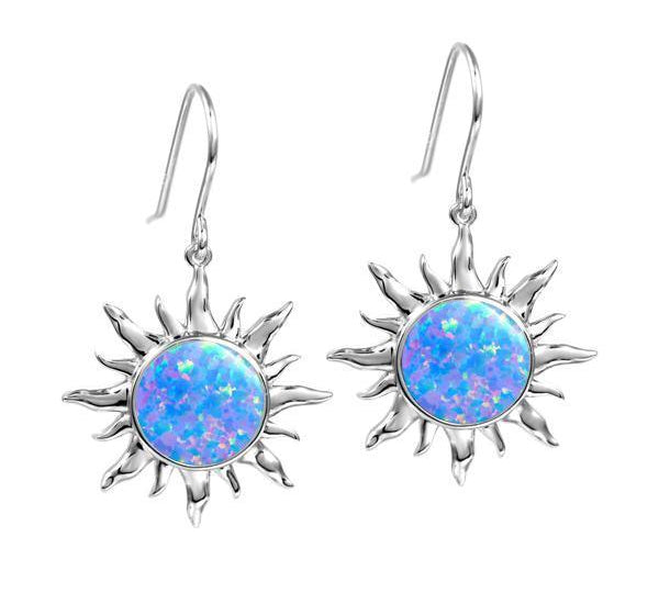 In this photo there is a pair of sterling silver sun hook earrings with blue opalite gemstones.