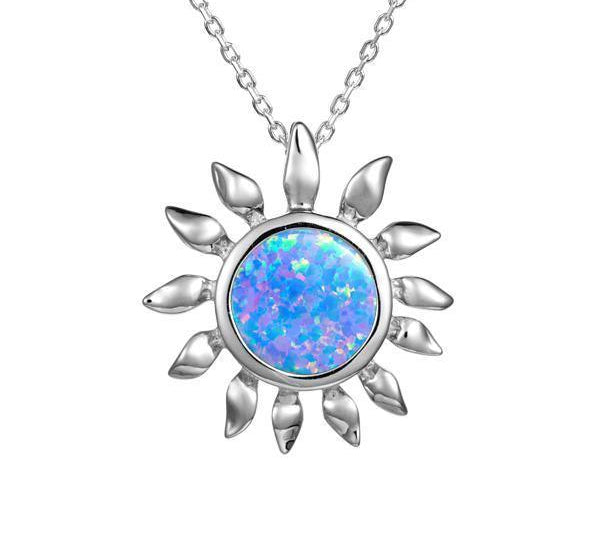 In this photo there is a sterling silver sunflower pendant with one blue opalite gemstone.