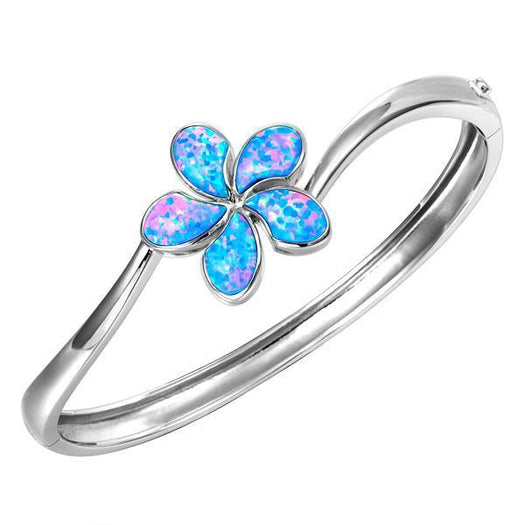 In this photo there is a 925 sterling silver plumeria bangle with blue opalite gemstones.