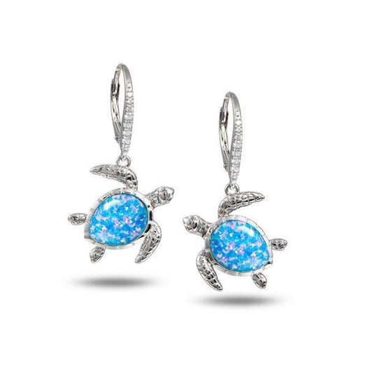 The picture shows a pair of 925 sterling silver opalite swimming sea turtle earrings with cubic zirconia.