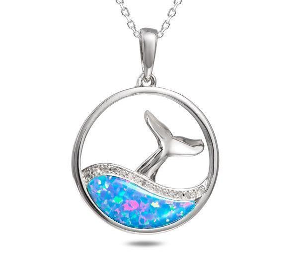 The picture shows a 925 sterling silver opalite whale tail wave pendant with topaz.