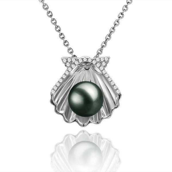 In this photo there is a white gold oyster shell pendant with a dark pearl and diamonds.