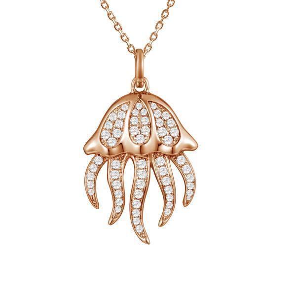 The picture shows a 925 sterling silver, rose gold plated, pavé barrel jellyfish pendant with topaz.