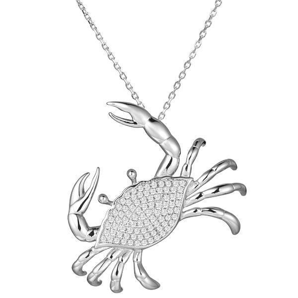 The picture shows a 925 sterling silver, white gold plated, pavé blue crab pendant with cubic zirconia.