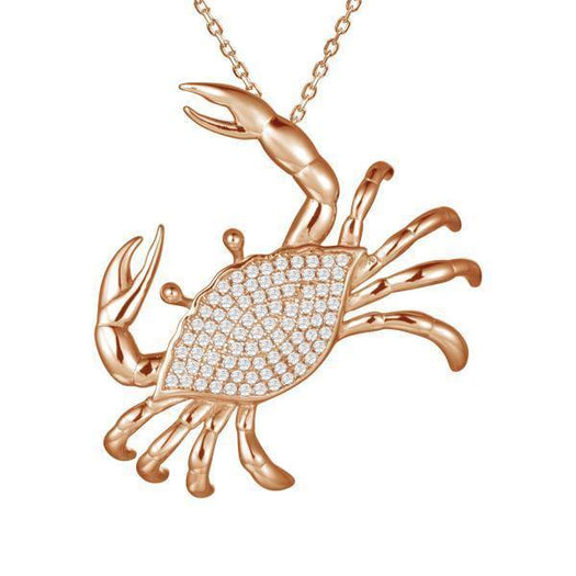 The picture shows a 925 sterling silver, rose gold plated, pavé blue crab pendant with cubic zirconia.