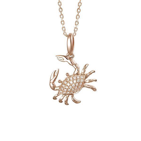 The picture shows a small 14K rose gold pavé diamond blue crab pendant.