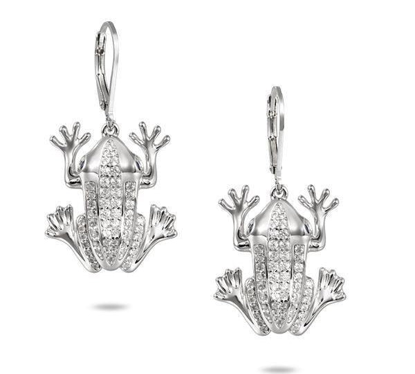 In this photo there is a pair of sterling silver coqui frog earrings with sapphire and cubic zirconia.