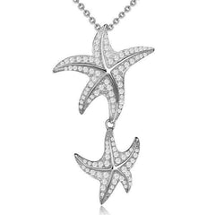 The picture shows a 14K white gold double starfish dangle pendant with diamonds.