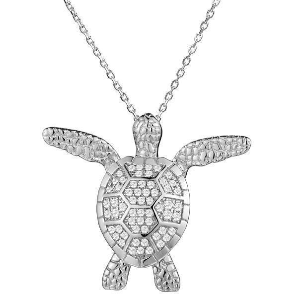The picture shows a 14K white gold sea turtle pendant with pavé diamonds.