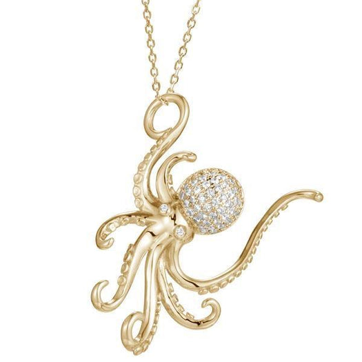 The picture shows a 925 sterling silver, yellow gold vermeil, pavé octopus pendant with topaz.