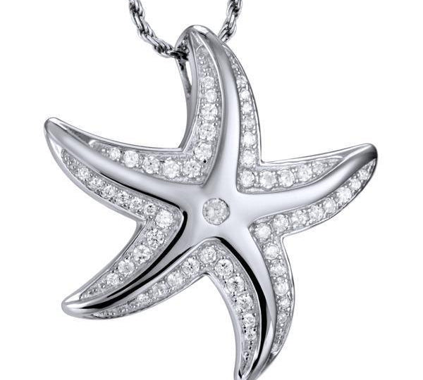 The picture shows a 14K white gold starfish pendant with pavé diamonds.