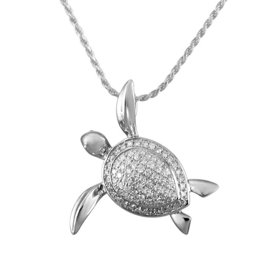 The picture shows a 925 sterling silver, white gold vermeil, sea turtle pendant with topaz.