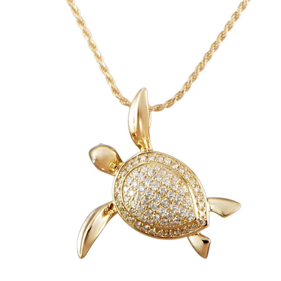 The picture shows a 925 sterling silver, yellow gold vermeil, sea turtle pendant with topaz.