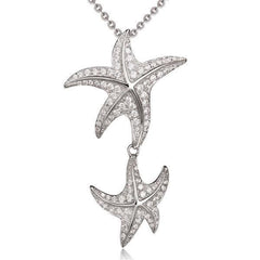 The picture shows a 925 sterling silver, white gold vermeil, hanging double starfish pendant with topaz.